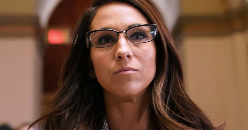 Lauren Boebert, pictured walking down a hallway in congress.