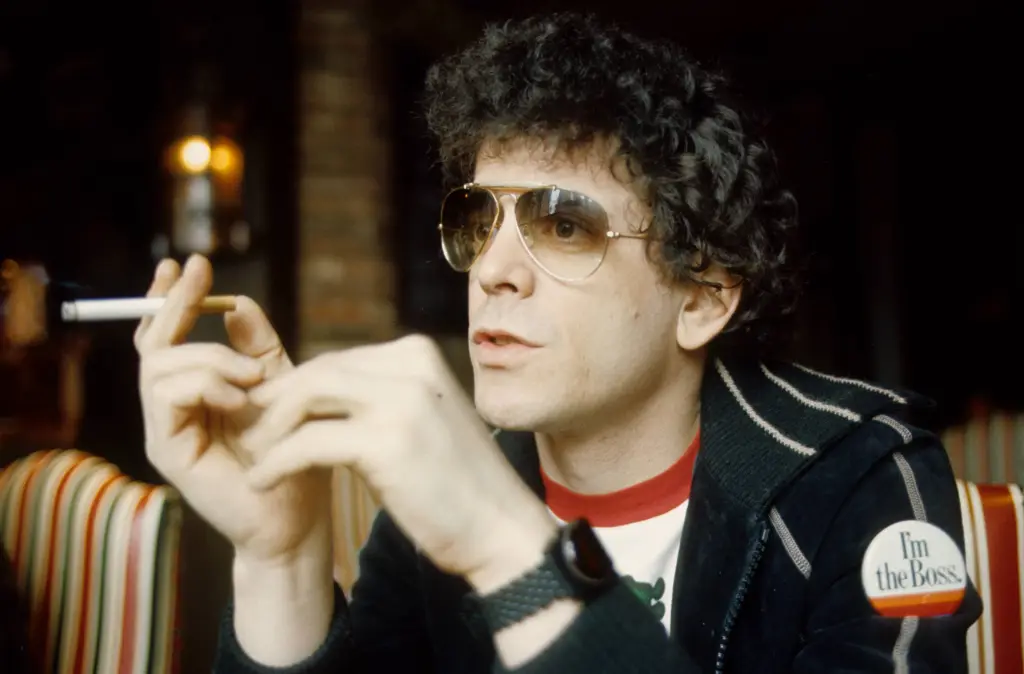Famous bisexual men: Lou Reed posed smoking a cigarette during an interview in Amsterdam, Netherlands in 1976.