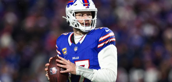 ORCHARD PARK, NY - JANUARY 21: Josh Allen #17 of the Buffalo Bills drops back to pass during an NFL divisional round playoff football game against the Kansas City Chiefs at Highmark Stadium on January 21, 2024 in Orchard Park, New York.