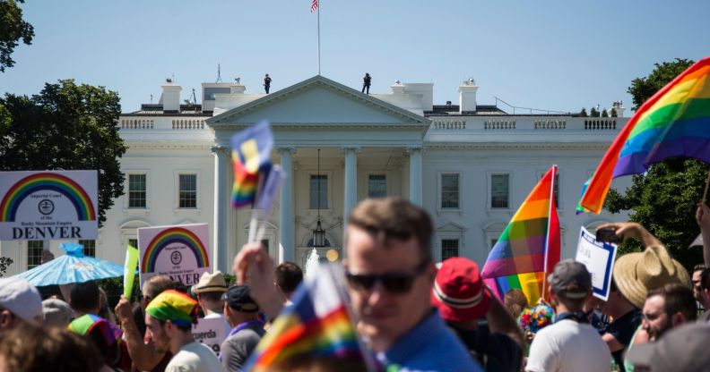 Demonstrators march past the White House during the Equality March for Unity and Peace on June 11, 2017 in Washington, DC