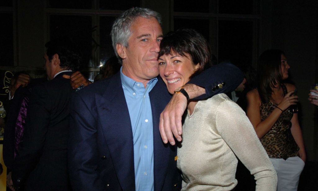 Jeffrey Epstein and Ghislaine Maxwell stand side by side with Epstein holding Maxwell close with his arm around her shoulders