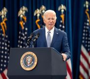 President Joe Biden speaks at a podium while announcing new initiatives expanding access to abortion and contraception on the anniversary of the Roe v Wade ruling