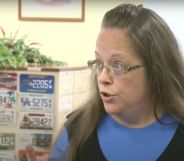 Kim Davis, a former county clerk who refused to issue marriage licenses to same-sex couples in Kentucky, wears a blue outfit as she talks to someone off camera