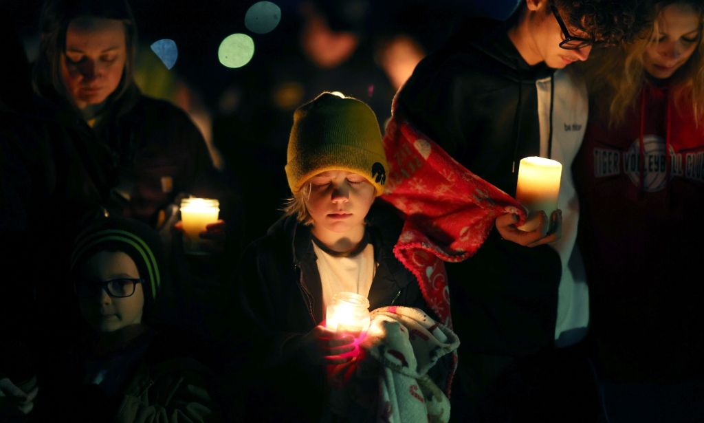 Community members gather in Wiese park for a candlelight vigil following the morning shooting at the Perry Middle School and High School complex on 4 January 2024 in Perry, Iowa. Right-wing figures have latched onto and spread misinformation that the shooter was part of the LGBTQ+ community and/or identified as trans