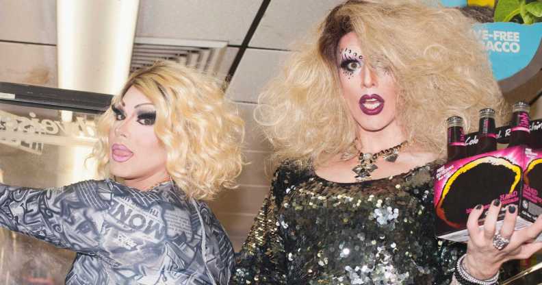 Two drag queens in a general store