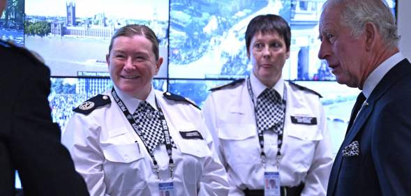 Photo shows two uniformed police officers meeting King Charles, the one on the left is Karen Findlay