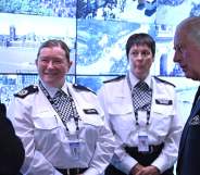 Photo shows two uniformed police officers meeting King Charles, the one on the left is Karen Findlay