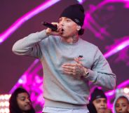 Rapper Central Cee performs on day 2 of Reading Festival 2023 at Richfield Avenue in Reading, England. He is wearing a grey sweatshirt and a black beanie hat. (Photo by Joseph Okpako/WireImage)