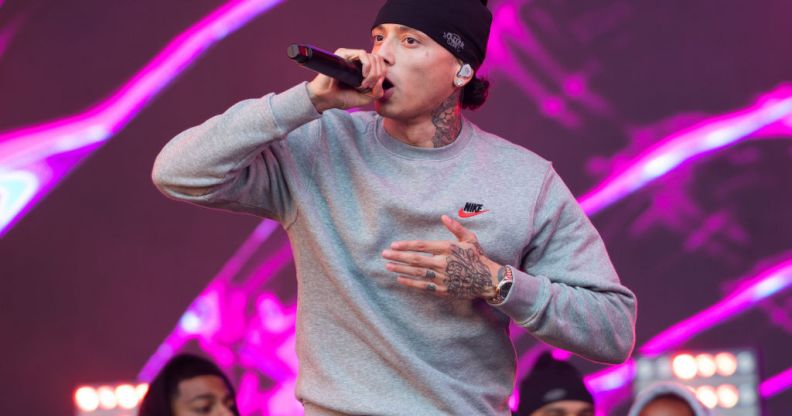 Rapper Central Cee performs on day 2 of Reading Festival 2023 at Richfield Avenue in Reading, England. He is wearing a grey sweatshirt and a black beanie hat. (Photo by Joseph Okpako/WireImage)