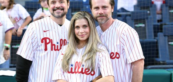 Photo shows Rider Strong and Will Friedle and Danielle Fishel at a baseball game in 2023.