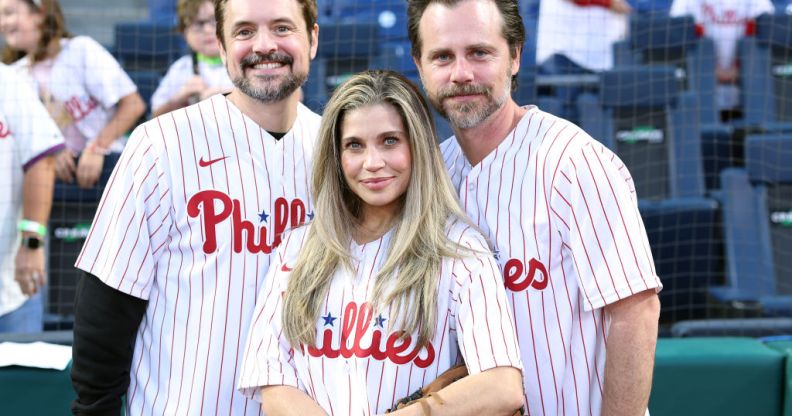 Photo shows Rider Strong and Will Friedle and Danielle Fishel at a baseball game in 2023.