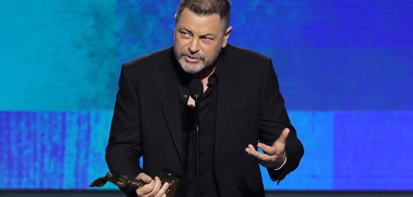 Nick Offerman at the Independent Spirit Awards, wearing a black suit