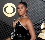 Janelle Monáe wearing a black and silver dress at the 2024 Grammys