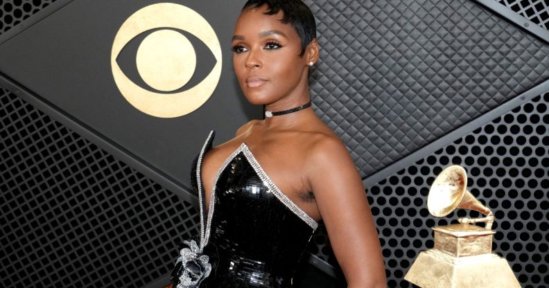 Janelle Monáe wearing a black and silver dress at the 2024 Grammys