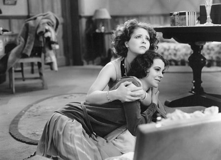 Scene from The Wild Party (1929) showing Clara Bow embracing another woman
