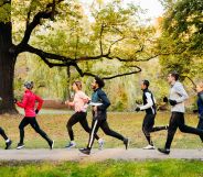 Six people of different genders and ages and race running in the woods, as Parkrun is a community event allowing for trans inclusion