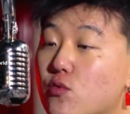 Image shows Canadian Rapper Eric Reprid singing into a microphone