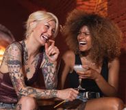 Stock image of two women in a bar to illustrate opening of London lesbian bar La Camionera