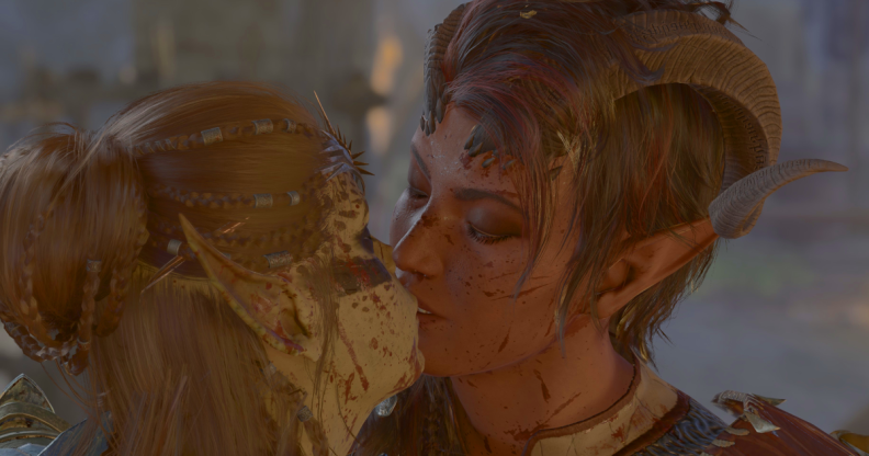 A screenshot from Baldur's Gate 3, showing characters Lae'zel and Karlach sharing a kiss.