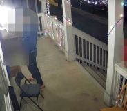 An Ohio man, who has been blurred out, is captured on surveillance video as he pees on an LGBTQ+ Pride flag outside a home