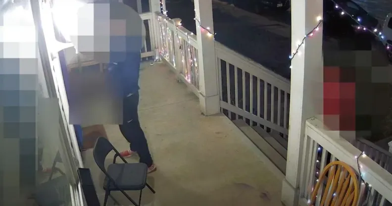 An Ohio man, who has been blurred out, is captured on surveillance video as he pees on an LGBTQ+ Pride flag outside a home
