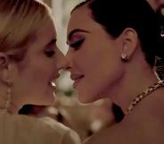 Kim Kardashian and Emma Roberts share a kiss in the American Horror Story Trailer. (YouTube/FX Networks)