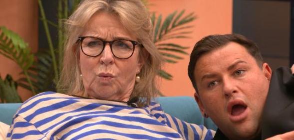 Image shows TV presenter Fern Britton and gay reality star David Potts cuddling up on the sofa in the CBB house