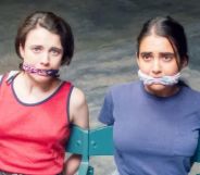 Margaret Qualley and Geraldine Viswanathan in Drive-Away Dolls.