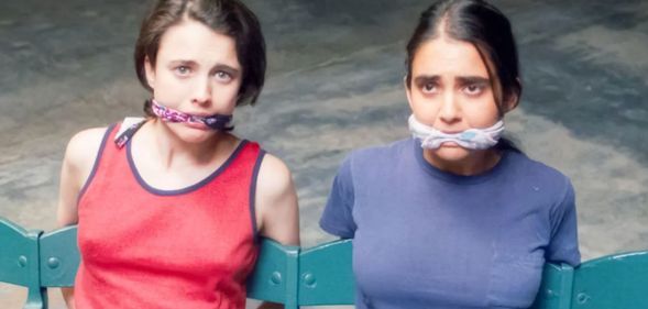 Margaret Qualley and Geraldine Viswanathan in Drive-Away Dolls.