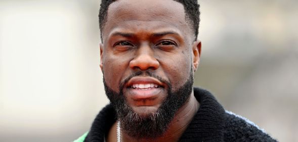 A portrait image of Kevin Hart smiling.