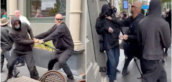 A shaven-headed man is seen fighting with other people outside a bar in Melbourne