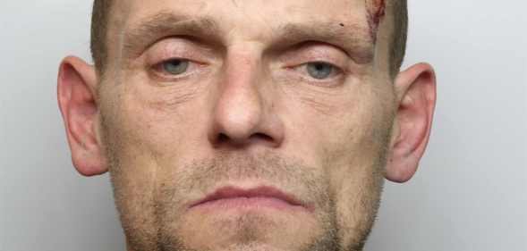 a mug shot of Pawel Flak