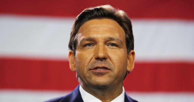 Florida governor Ron DeSantis in front of a US flag