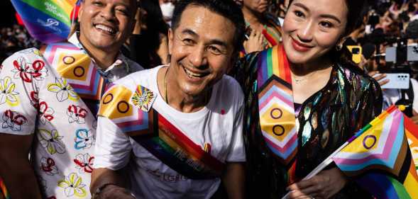 BANGKOK, THAILAND - JUNE 04: (L-R) Nattawut Saikua, Chonlanan Srikaew, and Paetongtarn Shinawatra, members of the Pheu Thai party, attend a Pride parade on June 04, 2023 in Bangkok, Thailand. Members of the LGBTQ community and allies take part in a Pride month march through central Bangkok. (Photo by Lauren DeCicca/Getty Images)