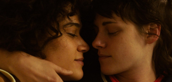 Kristen Stewart (right) has spoken about intimate scenes in Love Lies Bleeding (A24)