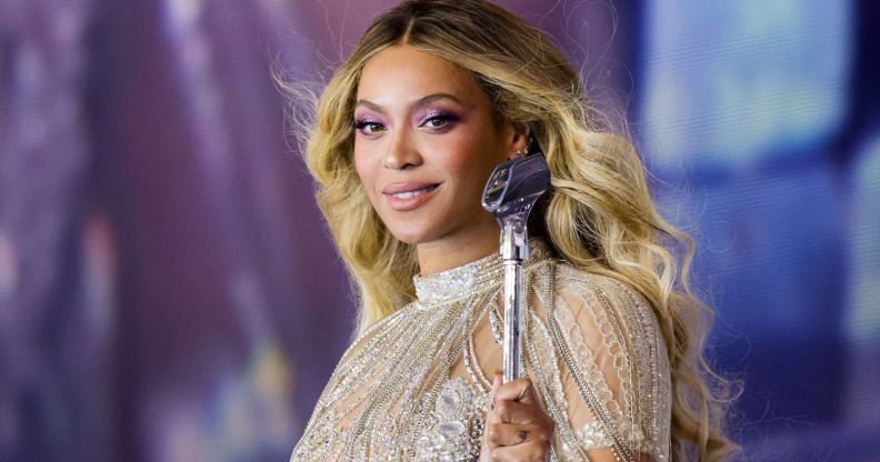 Beyoncé in a silver outfit while performing on the Renaissance tour.