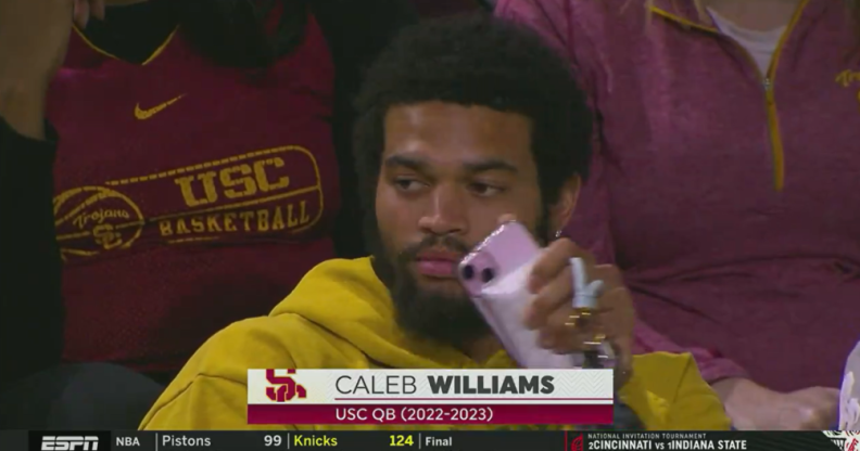 College football star Caleb Williams riles homophobes with pink phone, pink wallet and pink nails