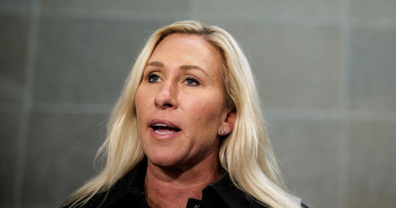 Georgia state representative Marjorie Taylor Greene, who has a history of making anti-LGBTQ+ and anti-abortion remarks online, speaks to people off camera