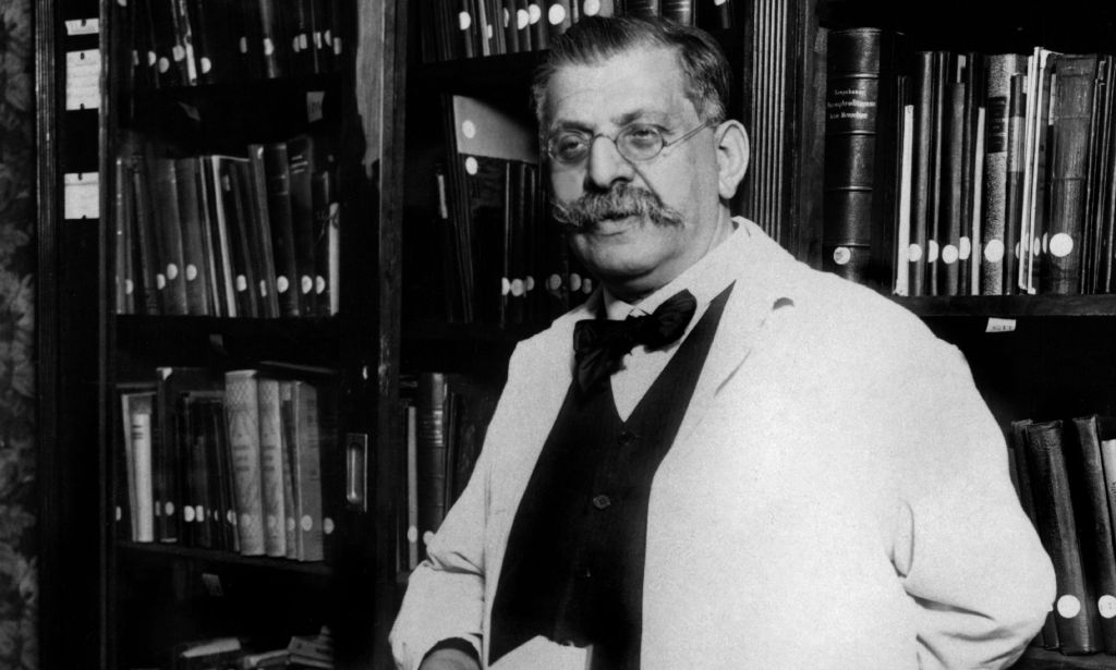 A picture of Magnus Hirschfeld in an institute that studied hte lives of trans people in Germany. The institute was attacked and papers destroyed by the Nazis during WWII
