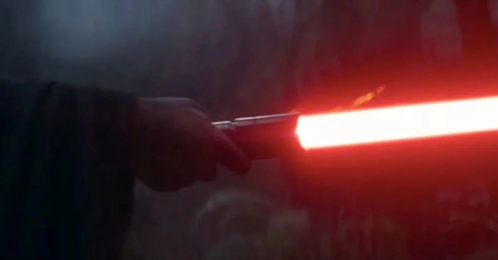 Image shows a Sith wielding a red lightsaber, all you can really see is the lightsaber though