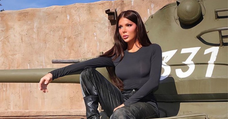 Blaire White sat on a green tank