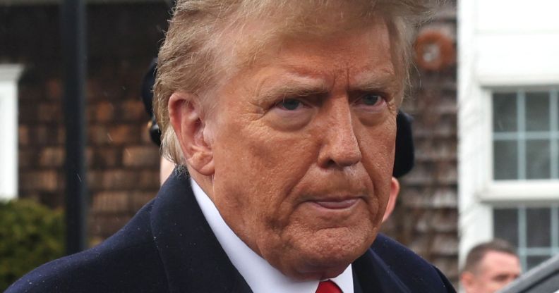 Donald Trump, standing in the rain and licking his lips.