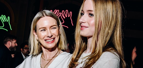 Photo shows Naomi Watts, 55, beaming with pride while looking at her daughter