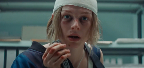 Hunter Schafer looks terrified with a bandaged head and bloody face in trailer for film Cuckoo.