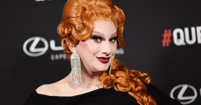 RuPaul's Drag Race winner Jinkx Monsoon in a ginger wig and black dress at the 2024 Queerty awards.