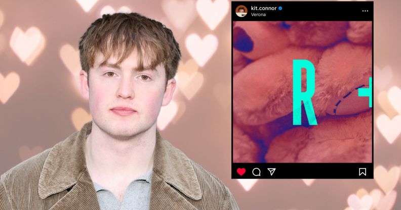A graphic with a light pink heart background. In the foreground, Kit Connor is in a grey top and beige jacket, and there is a screenshot of his instagram page, on which he has posted a cryptic "R".