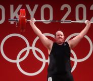 Photo of trans athlete Laurel Hubbard as she competes in the Tokyo 2020 Olympic Games in weightlifting
