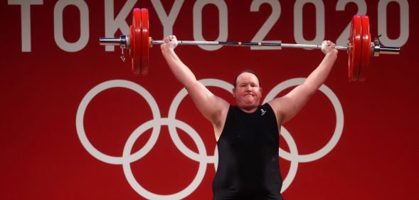 Photo of trans athlete Laurel Hubbard as she competes in the Tokyo 2020 Olympic Games in weightlifting