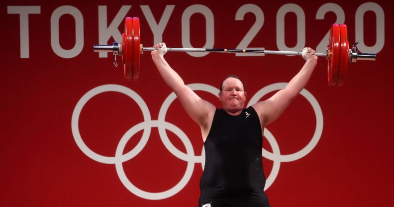 Photo of trans athlete Laurel Hubbard as she competes in the Tokyo 2020 Olympic Games in weightlifting