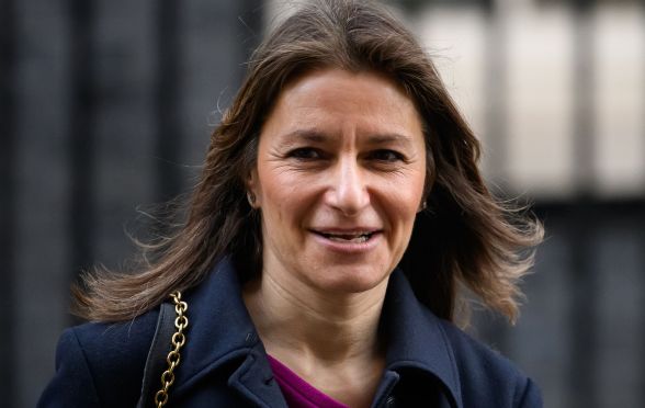 UK culture secretary Lucy Frazer smiling as she walks by Number 10 Downing Street.